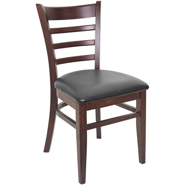 A BFM Seating Berkeley beechwood restaurant chair with a black vinyl seat.