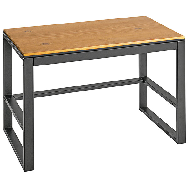A Cal-Mil nesting table with a rustic wooden top and metal frame.