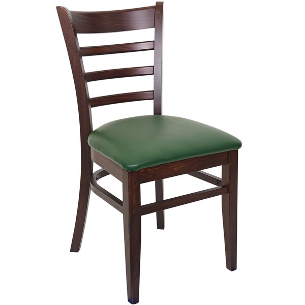 A BFM Seating Berkeley beechwood restaurant chair with green vinyl seat and back.