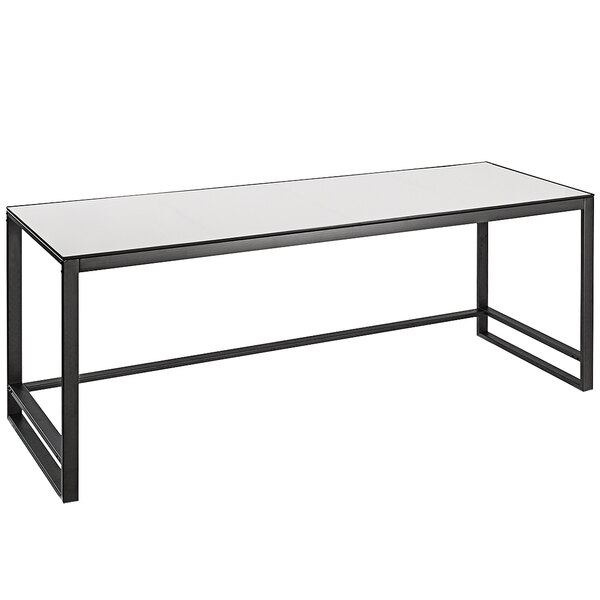 A white table with metal legs and a white surface.
