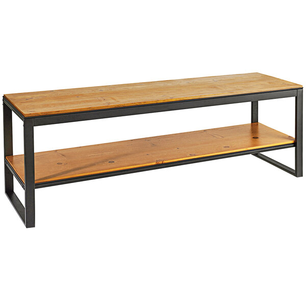 A Cal-Mil Madera rustic pine nesting table with two shelves and metal legs.
