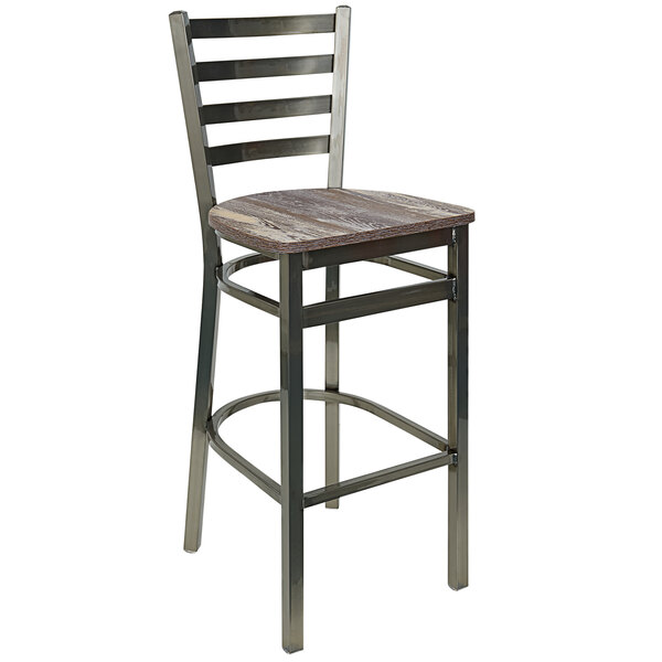 A BFM Seating metal ladder back barstool with a wooden seat.