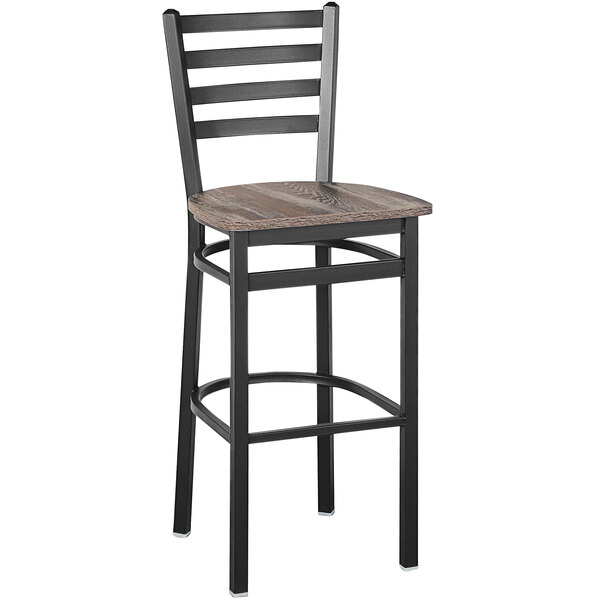 A BFM Seating Lima black steel ladder back barstool with a wood seat.