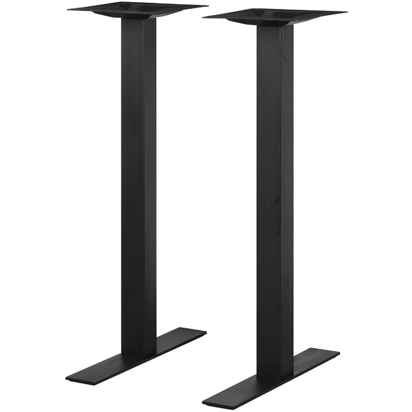 A pair of BFM Seating black steel bar height table bases.