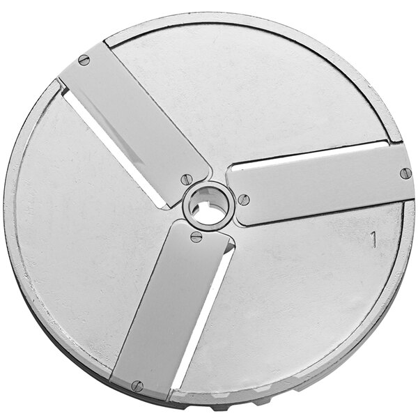 A circular metal Sirman 1/16" slicing disc with holes.