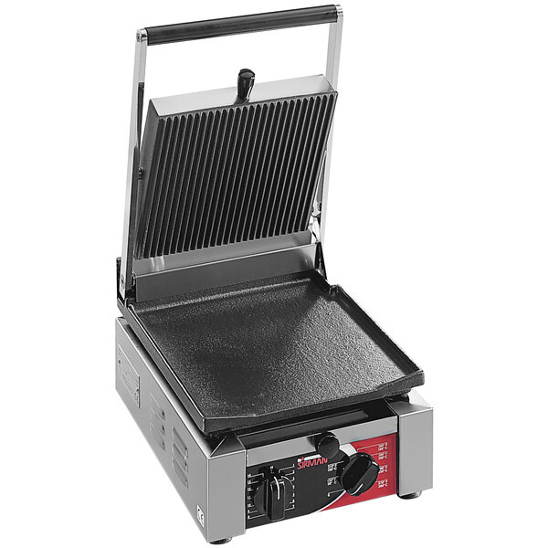 A Sirman ELIO L single panini grill with grooved top and smooth bottom plates on a counter.