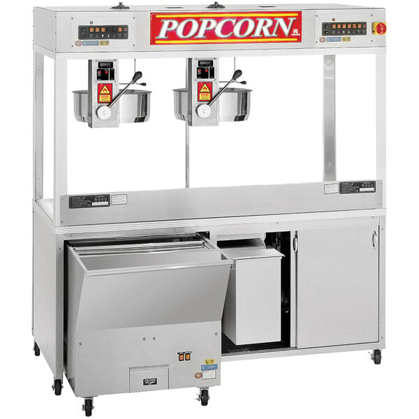 A Cretors popcorn machine with two kettles.