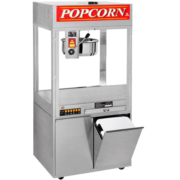 A Cretors floor model popcorn machine with a silver lid open.