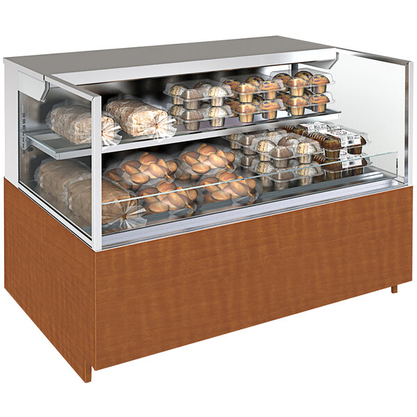 A Structural Concepts Reveal non-refrigerated self-service display case with food on shelves.