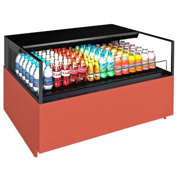 A Structural Concepts Reveal refrigerated self-service air curtain merchandiser on a counter with bottles of soda and soft drinks.