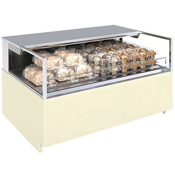 A white Structural Concepts Reveal non-refrigerated self-service display case with food displayed inside.