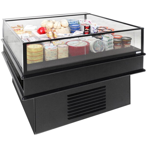 A black Structural Concepts refrigerated mobile island display case with food inside.