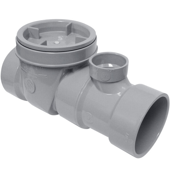 A grey plastic Endura flow control device for a pipe with a hole.