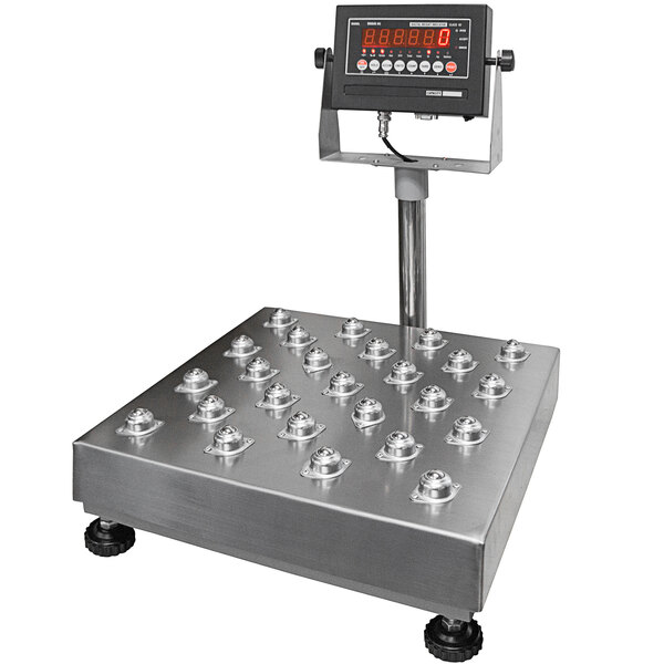 An Optima Weighing Systems bench scale with a digital display on a metal square.