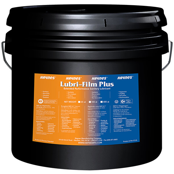 A black bucket of Haynes 59 Lubri-Film Plus with a blue and orange label.