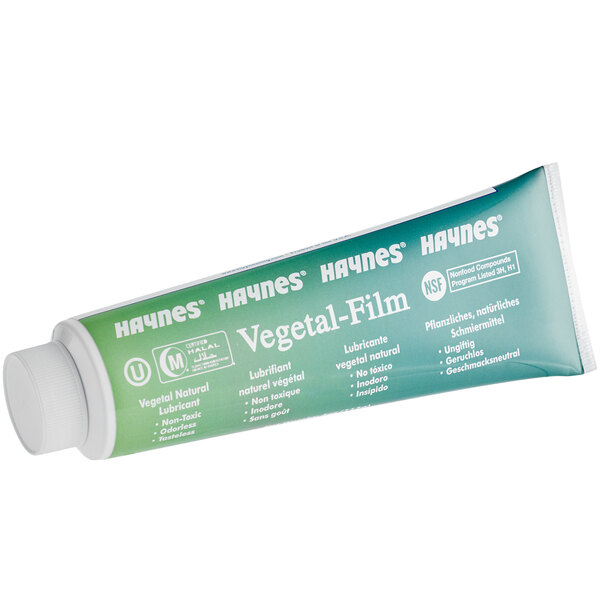 A white tube of Haynes 15 Vegetal-Film vegetable-based lubricant with green text.