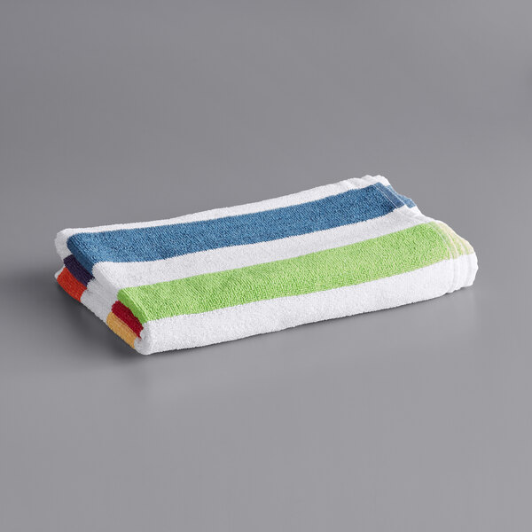 A stack of Oxford multicolor striped pool towels.