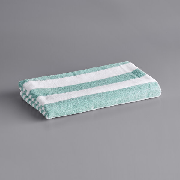An Oxford mint green and white striped pool towel.