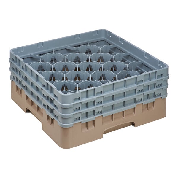 A beige plastic Cambro glass rack with extenders.