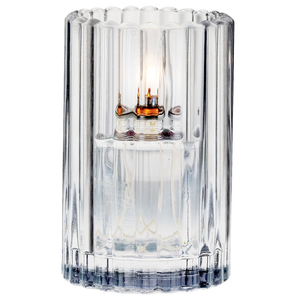 A clear glass candle holder.