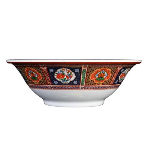 A close-up of a Thunder Group Peacock melamine bowl with a colorful fruit design.