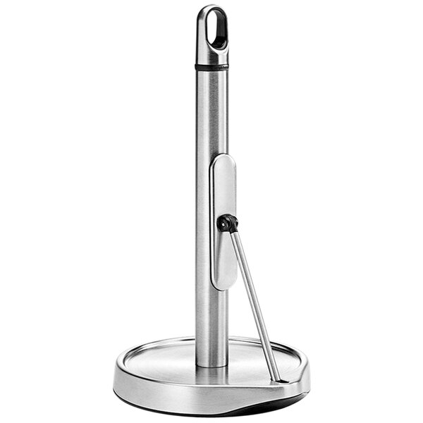 A simplehuman stainless steel tension arm paper towel holder on a counter.