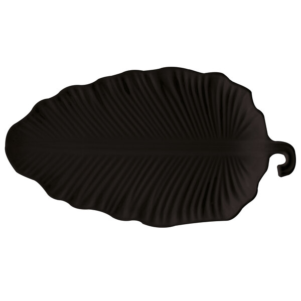 A black leaf-shaped Sonoma melamine platter.