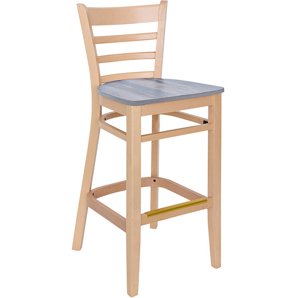 A BFM Seating wooden barstool with a wooden seat and ladder back.