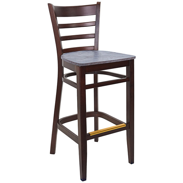 A BFM Seating wooden bar stool with a copper seat.