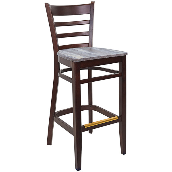 A BFM Seating Berkeley dark walnut wooden ladder back barstool with a wooden seat.