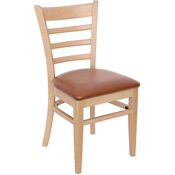 A BFM Seating Berkeley wooden restaurant chair with a light brown vinyl seat.