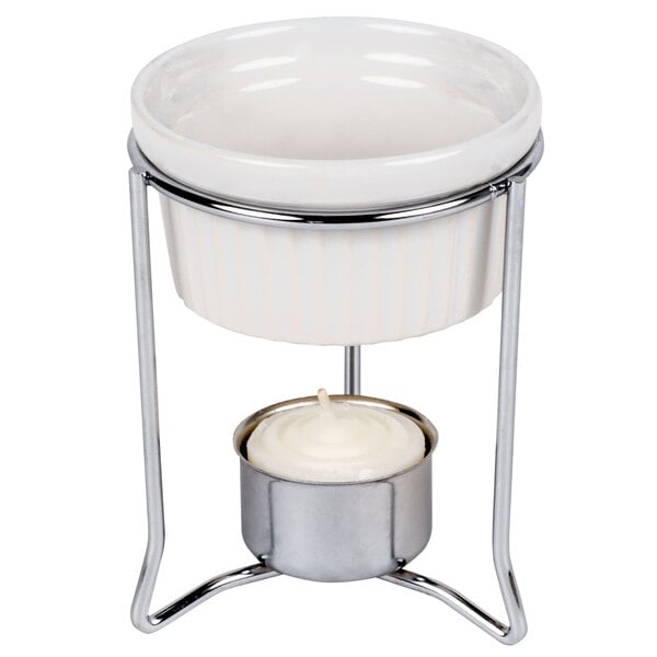 An American Metalcraft white ceramic butter warmer with a candle in a white bowl.