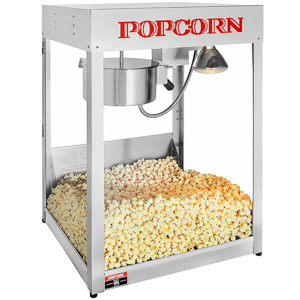 A Cretors Trilogy popcorn popper with popcorn in it.