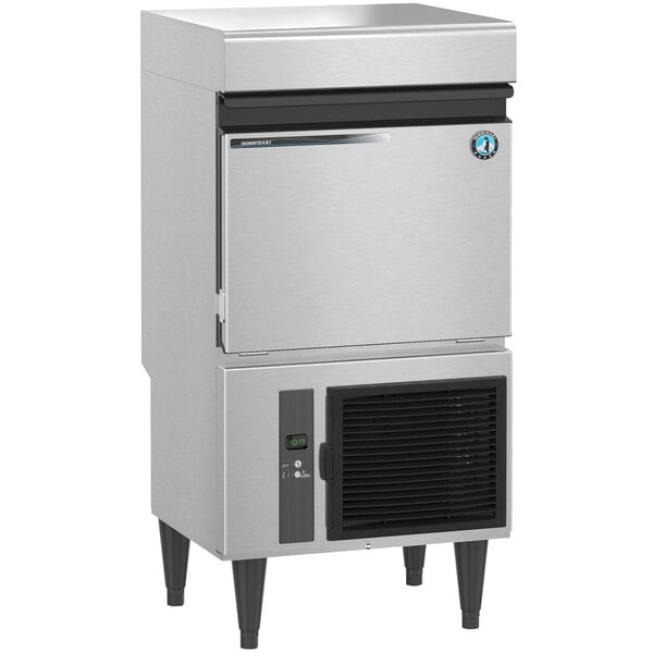 A stainless steel Hoshizaki undercounter ice machine with a black vent.