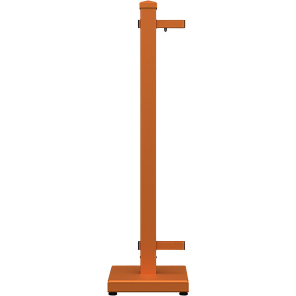A tall burnt orange metal end stand with a handle on it.