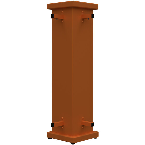 A rectangular orange corner planter with circle top cut-out on black legs.