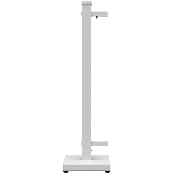 A white metal pole with a white base.