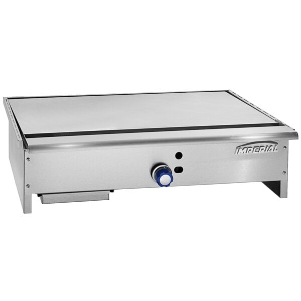 A stainless steel Imperial Range teppanyaki griddle with a blue knob.