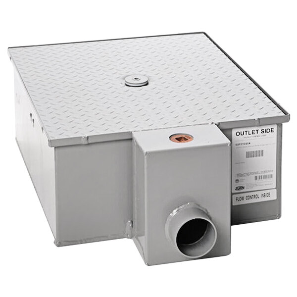 A grey metal rectangular Zurn grease trap with a hole in the top.
