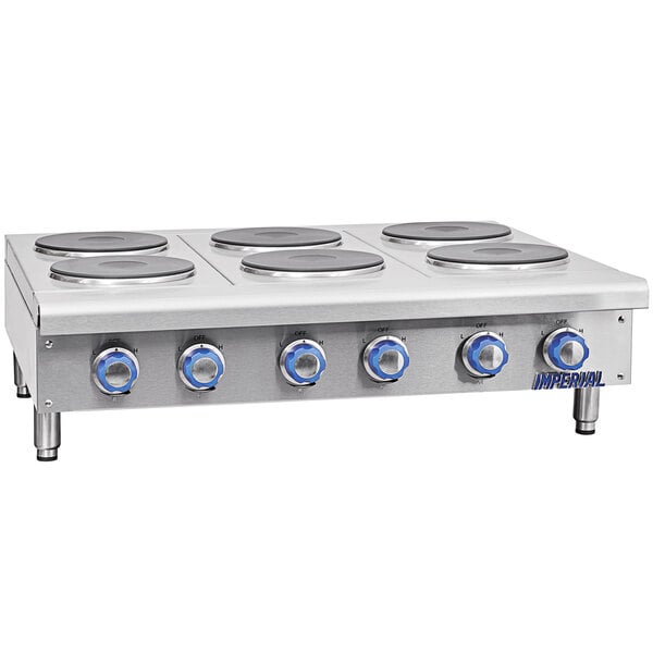 A stainless steel Imperial electric countertop hot plate with six burners.