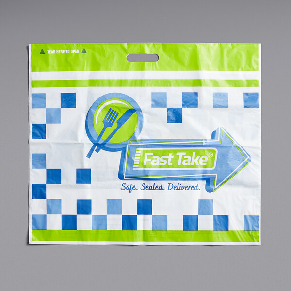 A Fast Take plastic bag with a logo and a green and blue arrow.