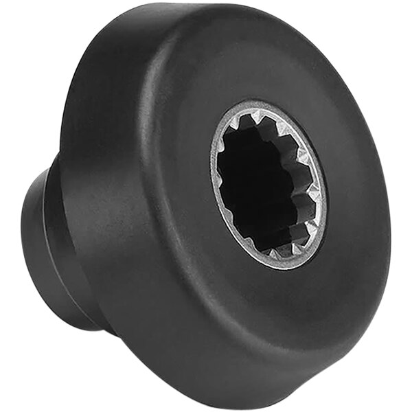 A black round drive coupling with a silver center.