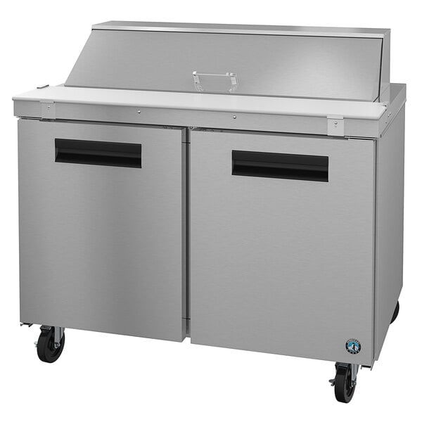 A large stainless steel Hoshizaki refrigerated counter with two doors.