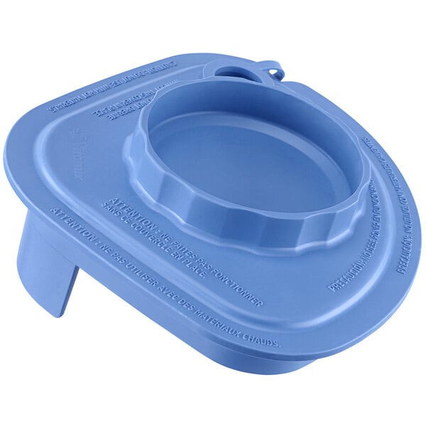 A blue plastic lid with a tethered plug and a hole in it.