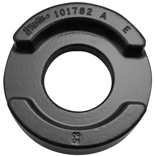 A black Vitamix retainer nut with a hole in the center.