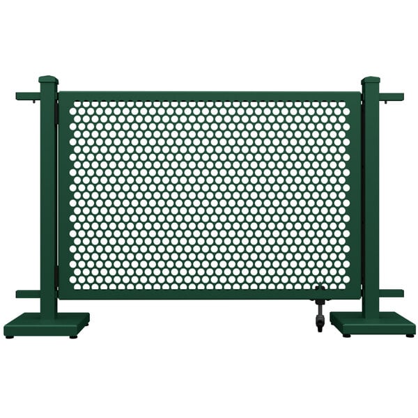 A forest green metal gate with a circle pattern and straight stands.
