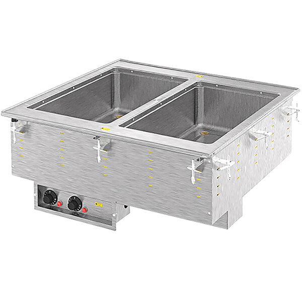 A Vollrath drop-in hot food well with two compartments in a countertop.