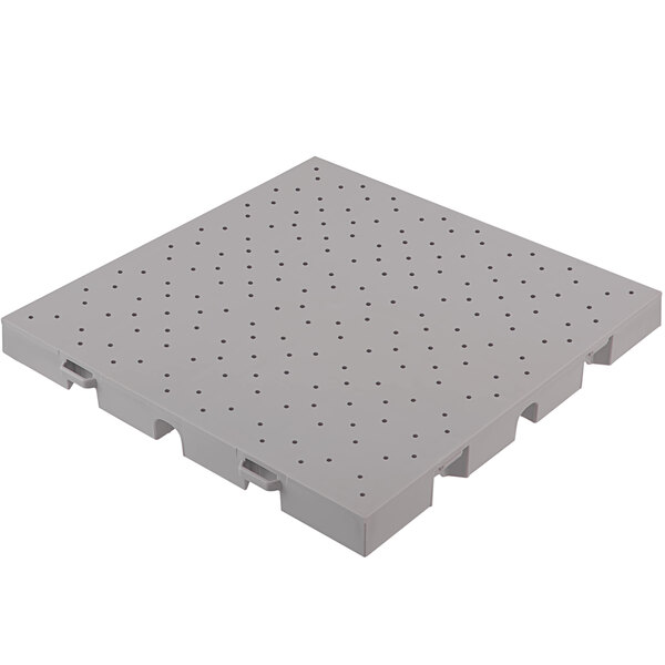 A grey plastic square EverBase drainage top with holes.