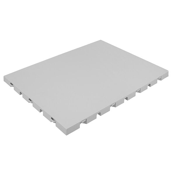 An EverBlock Flooring EverBase 3 gray plastic flooring tile with drainage holes.