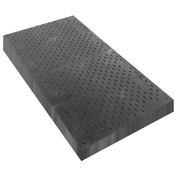 A black rectangular EverRoad access mat with holes in it.